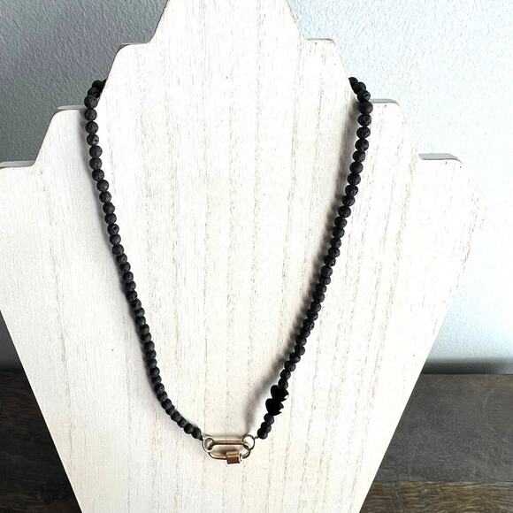 Black beaded necklace with gold tone pendant - Picture 2 of 4